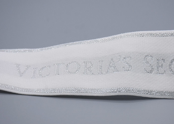 Parlak Gümüş Logolu Giyim Özelleştirilmiş 35mm Beyaz Jakarlı Elastik Bant